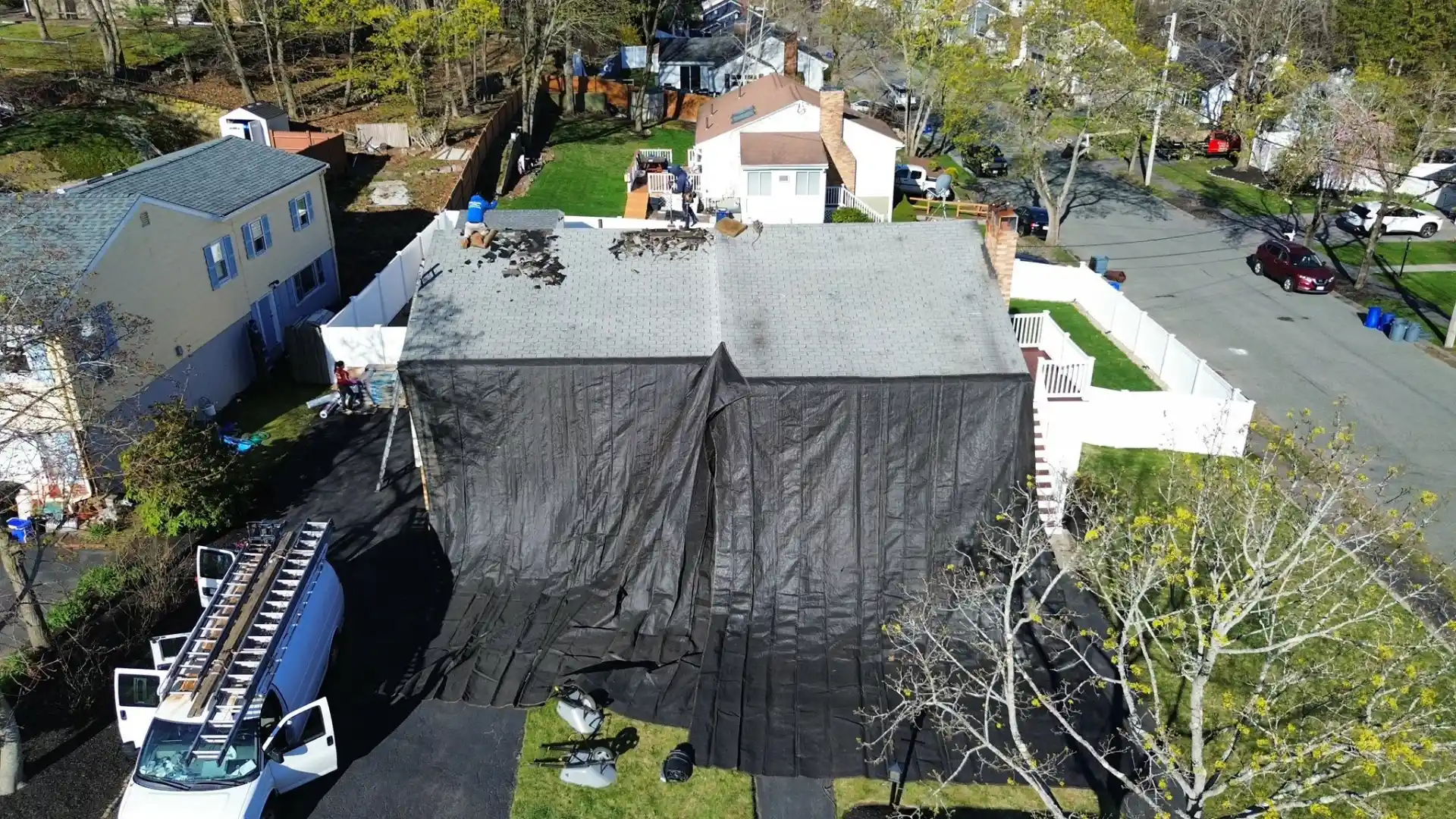 AJ Roofing Corp storm damage emergency tarping aerial view in Massachusetts